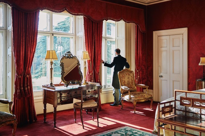 a living room filled with furniture and a window